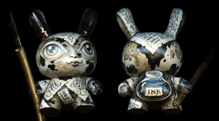 custom dunny, hand-painted vinyl toy, featuring an ink bottle and dip pen nibs